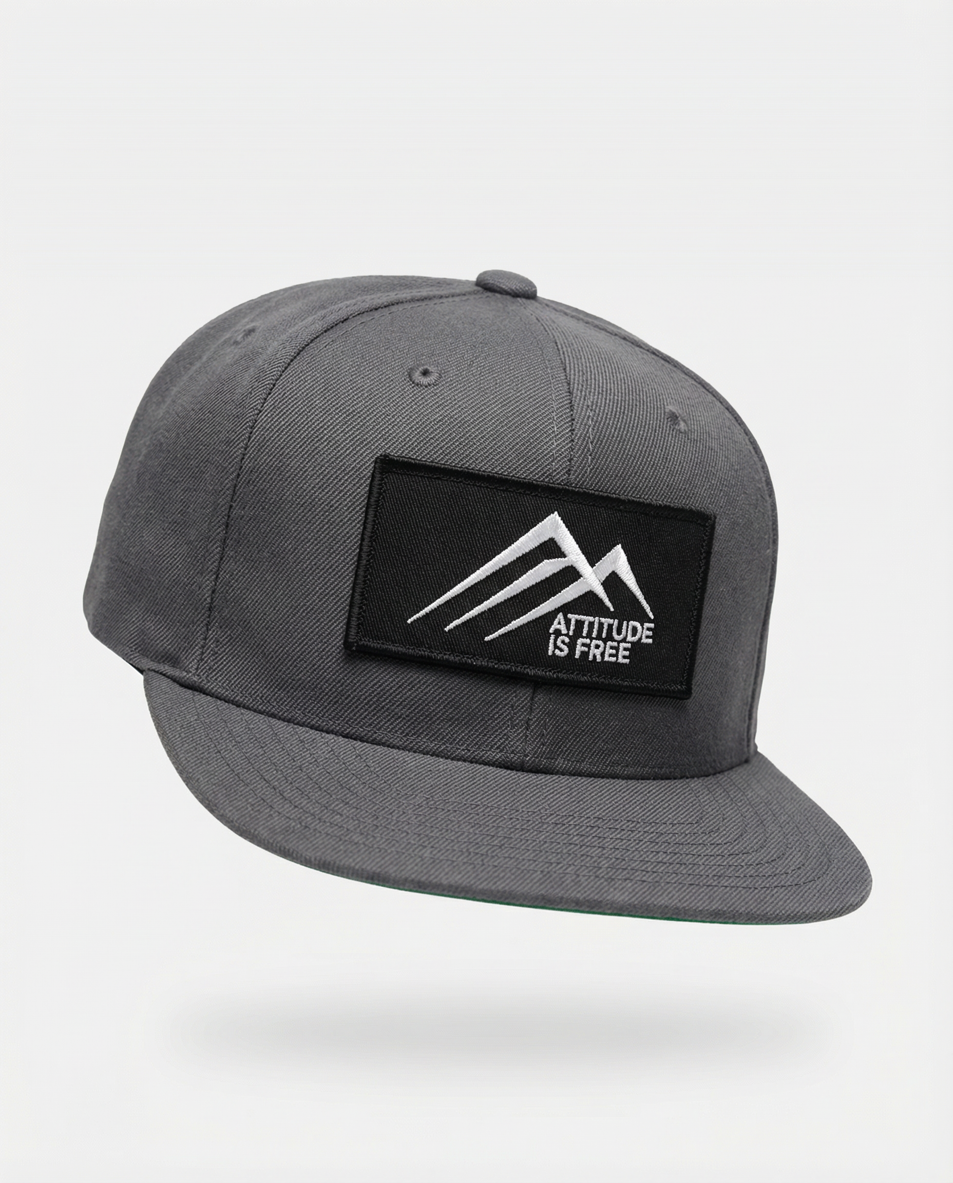 Generated_with_Kive.ai_-_hex_code_f2f2f2_for_the_background__put_this_snapback_hat_as_an_elevate_studio_style_image_for_the_website-3.png